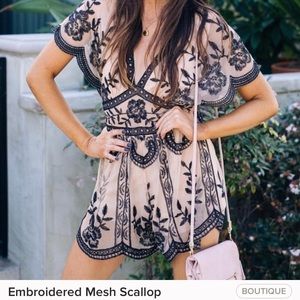 Black and nude mesh romper.